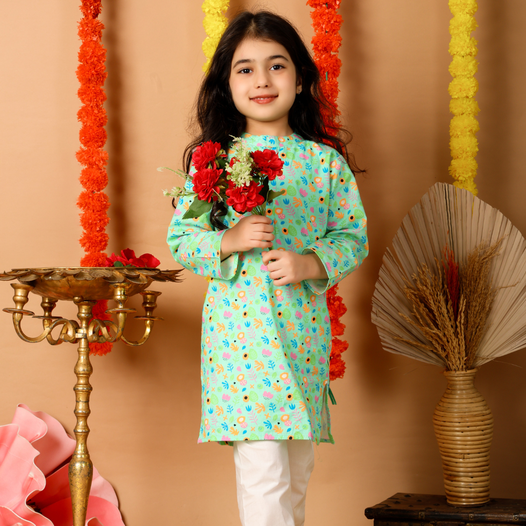 Flower Pop Kurta Set: A vibrant pink kurta with a floral print and matching pants.