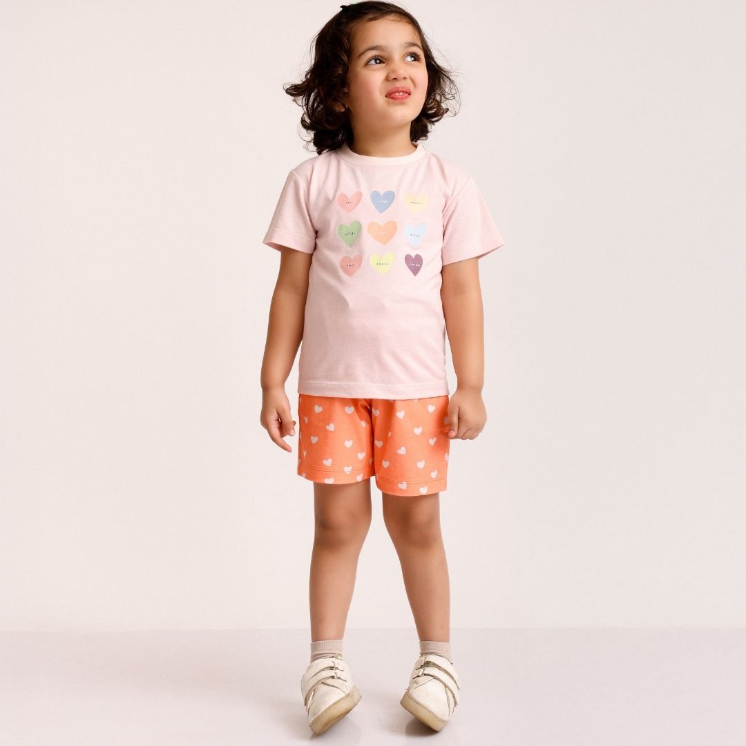 Amour Cotton T-Shirt & Shorts Set: White t-shirt with "Amour" text and matching white shorts.