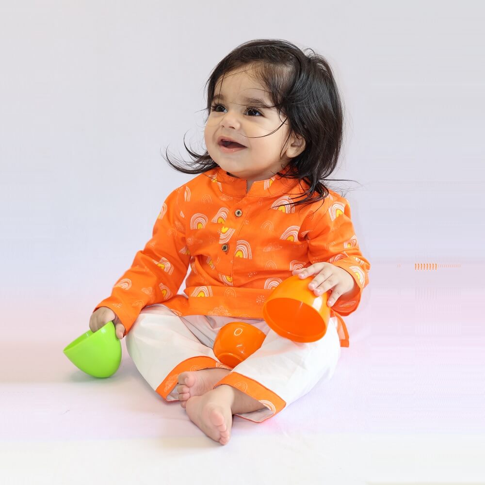 Orange Rainbows Cotton Kurta Set featuring a vibrant rainbow pattern on a comfortable cotton kurta with matching bottoms.