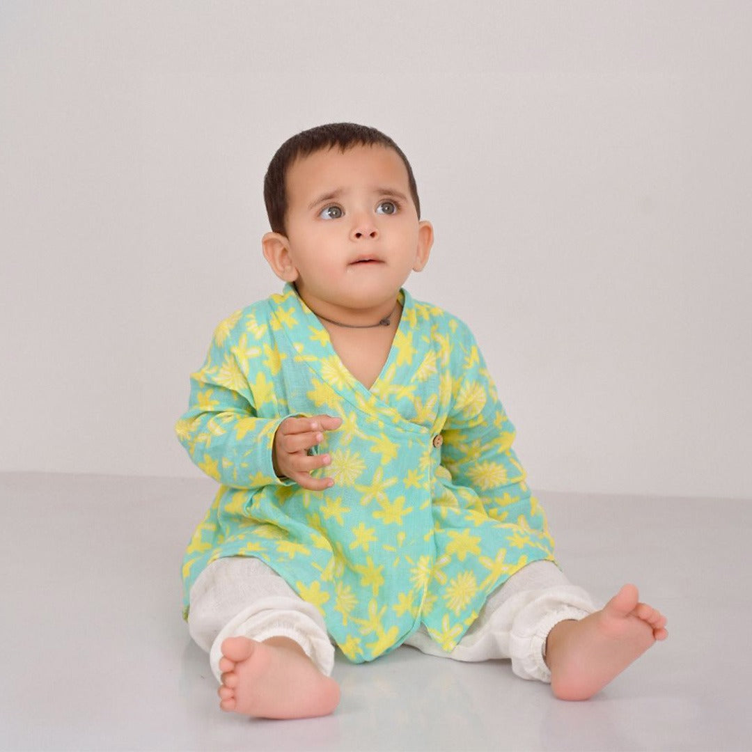 Summer Daisies Muslin Angrakha Set: A delicate white muslin angrakha with floral embroidery and a matching dupatta.