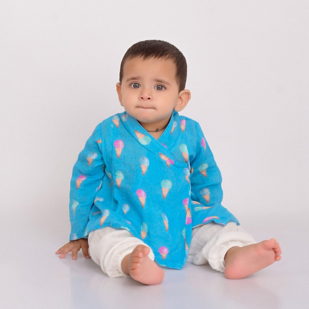 Raspberry Icecream Muslin Angrakha Set on a mannequin, featuring a flowing, knee-length angrakha with intricate embroidery