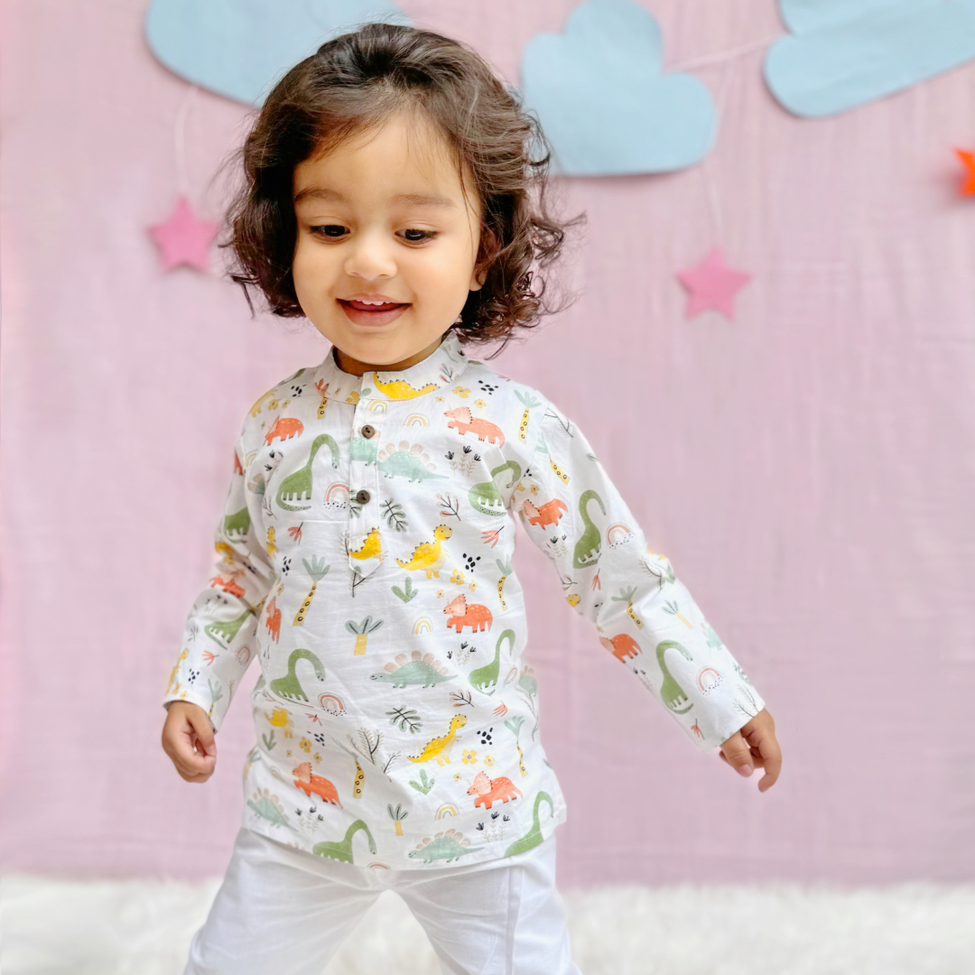 A cotton kurta set for kids with a fun dancing dinosaur print, perfect for playtime.