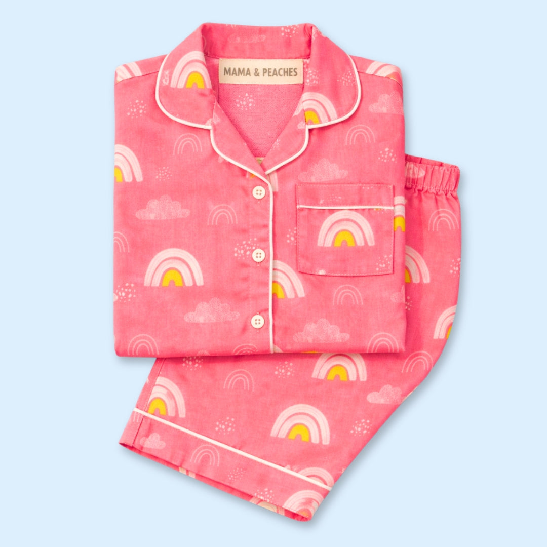 A Pink Rainbows Full Sleeves Night Suit featuring a cheerful rainbow print on a soft pink background.