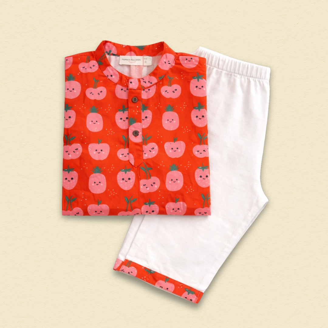 A model wears the Bright Berry Kurta Set, featuring a vibrant pink kurta with intricate white embroidery and matching pants.