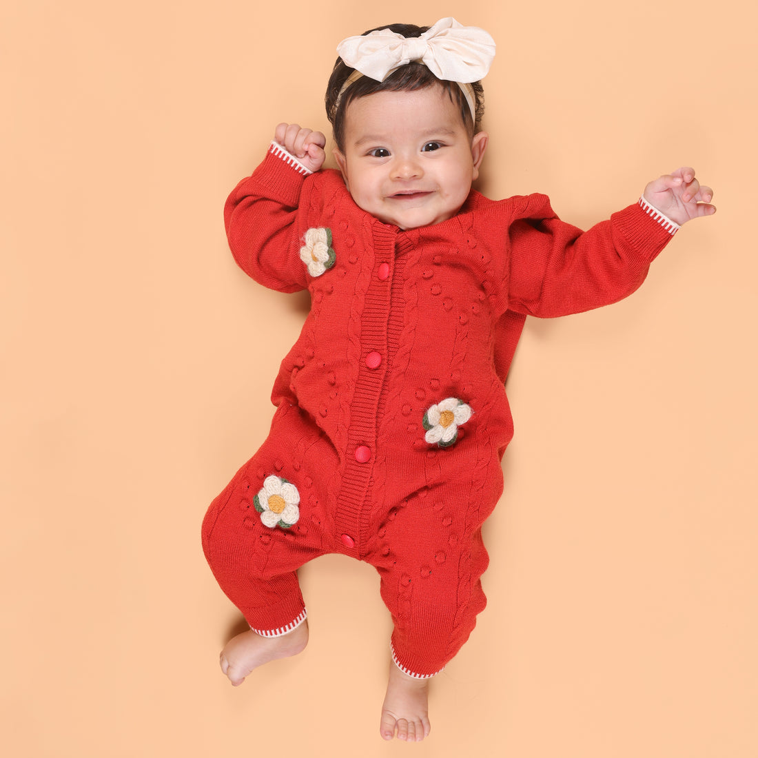 Red Daisy Cable Knit Winter Romper for babies.