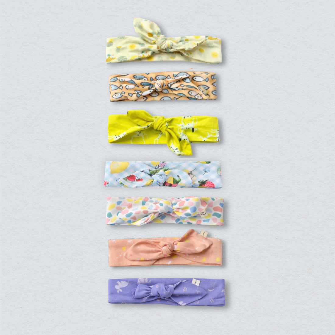 Bundle of colorful cotton headbands, perfect for workouts or fashion.