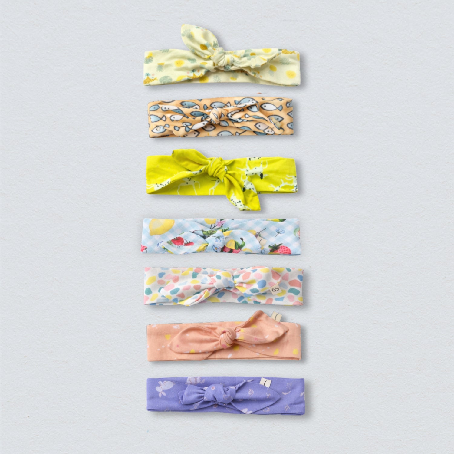 Bundle of colorful cotton headbands, perfect for workouts or fashion.