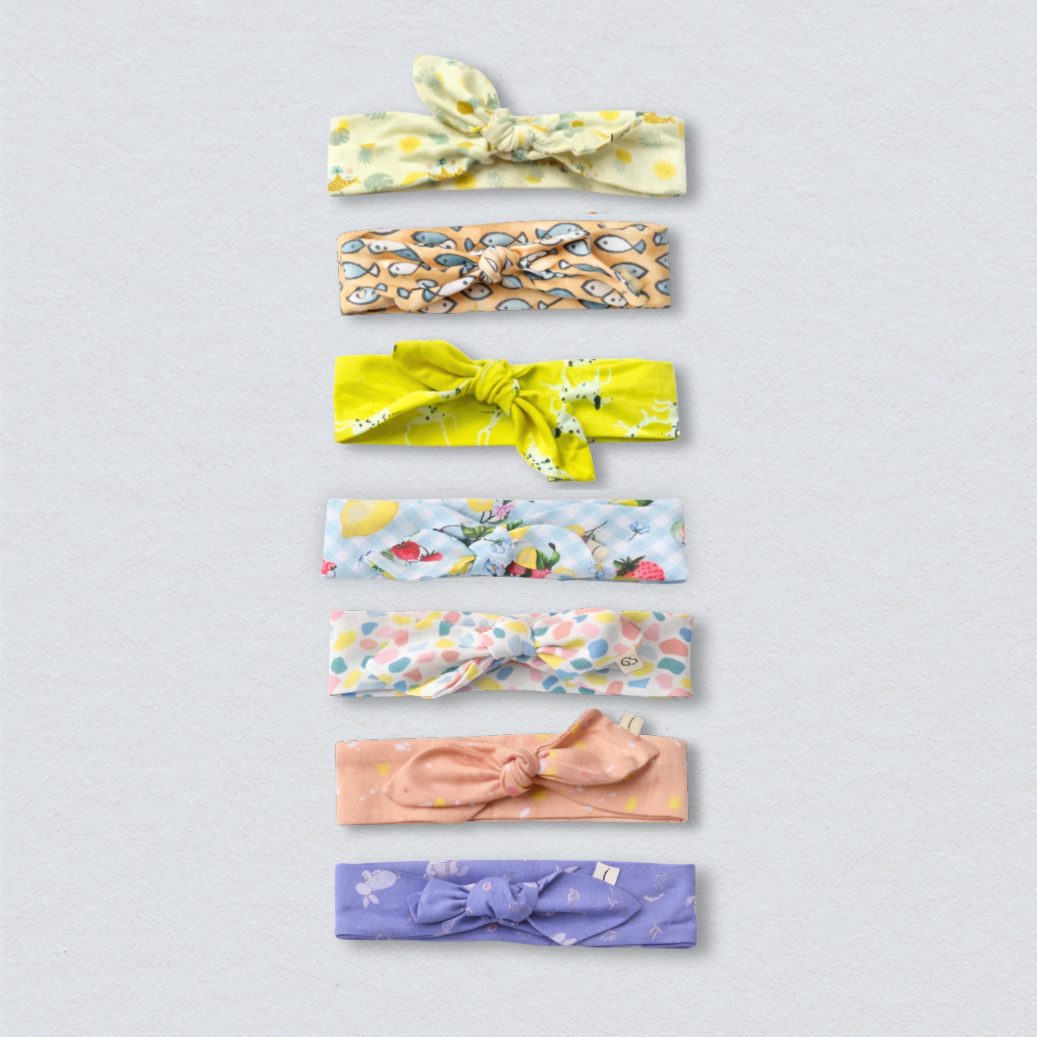 Bundle of colorful cotton headbands, perfect for workouts or fashion.